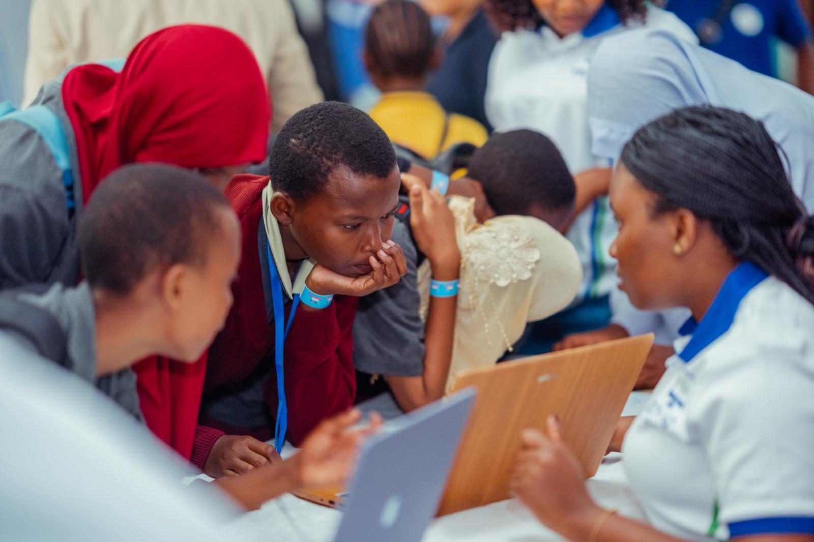 A group of students learning with a TECH IQ instructor